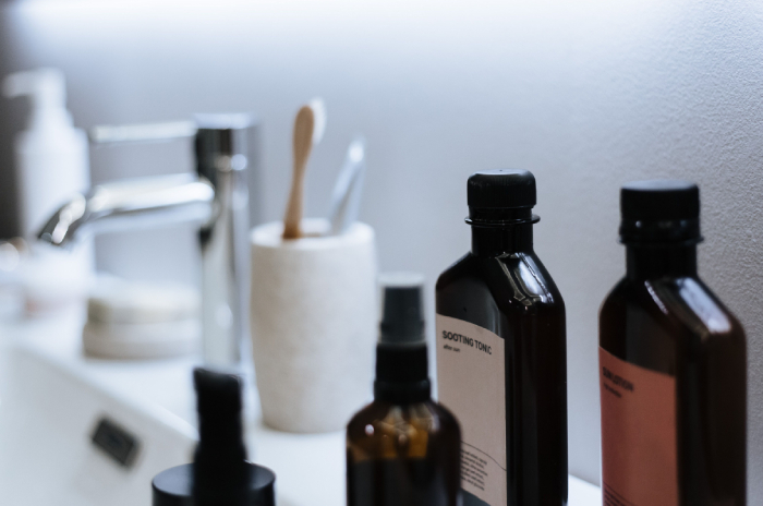 full skincare routine in bathroom